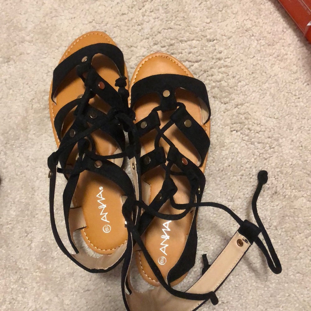 Never worn tie up sandals from a boutique!!